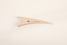 Golden Blonde TopBun hair clip against neutral background