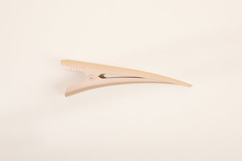 Golden Blonde TopBun hair clip against neutral background